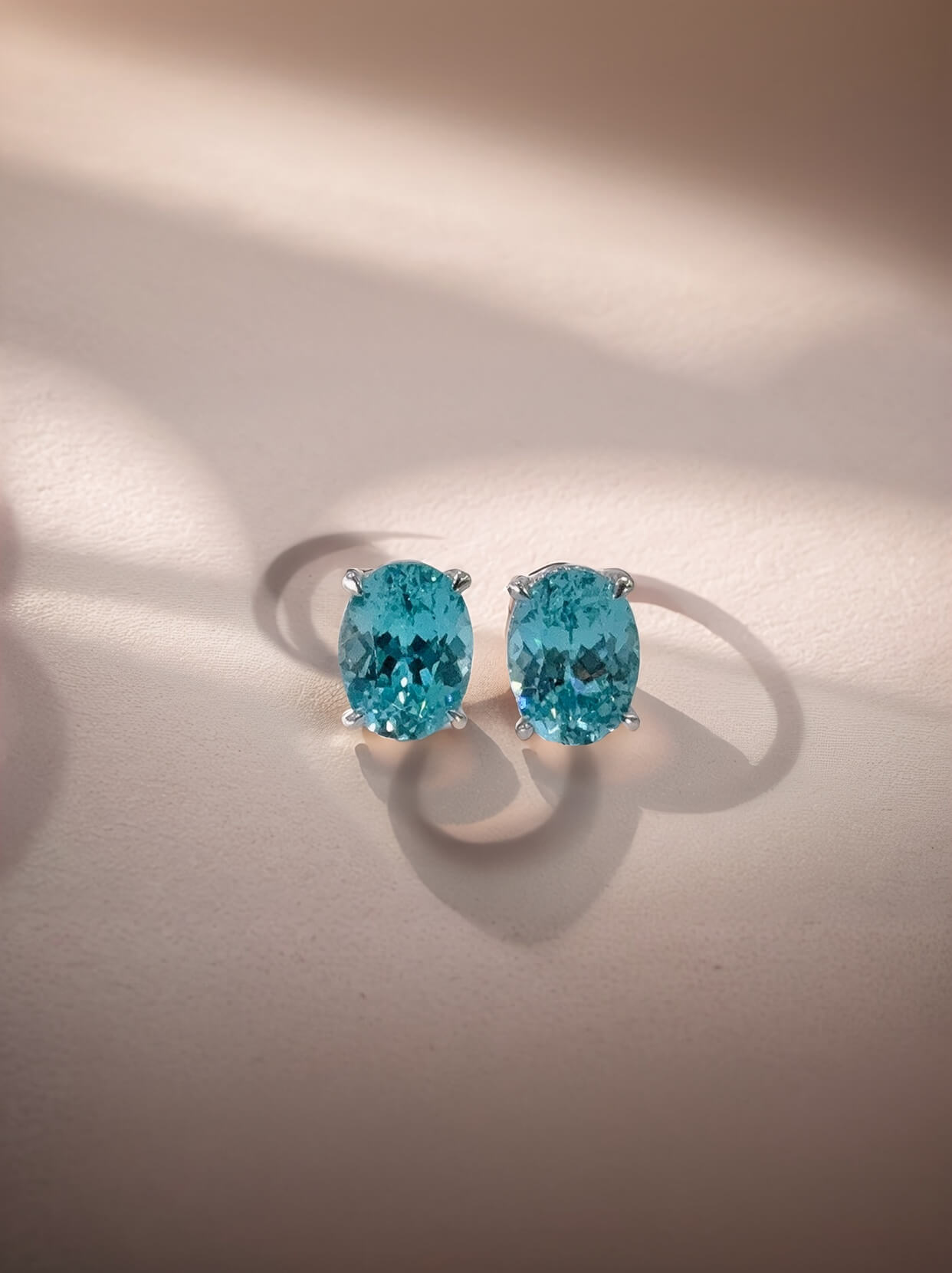 4 prongs oval cut lab grown Paraiba earrings stud