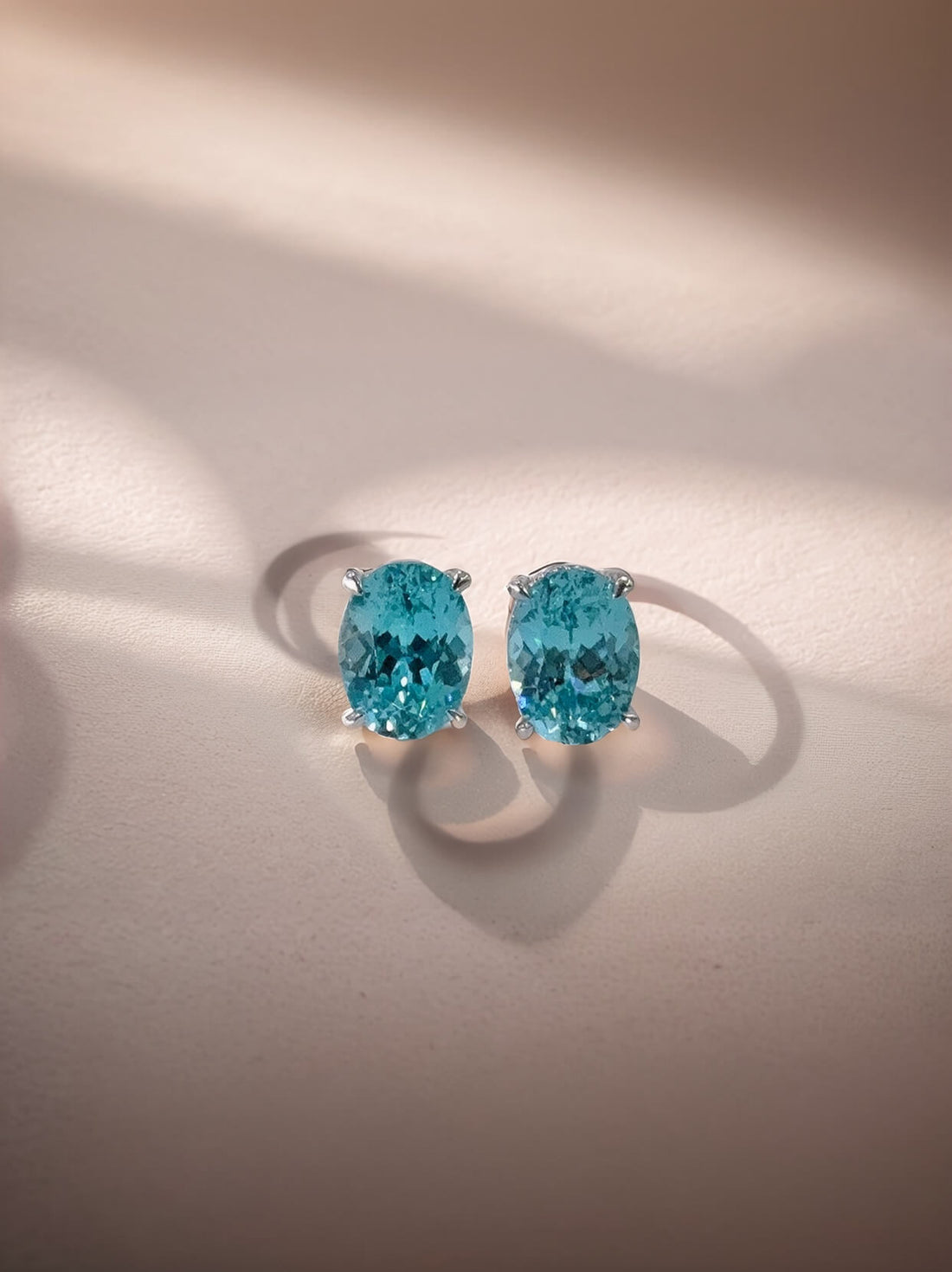 4 prongs oval cut lab grown Paraiba earrings stud