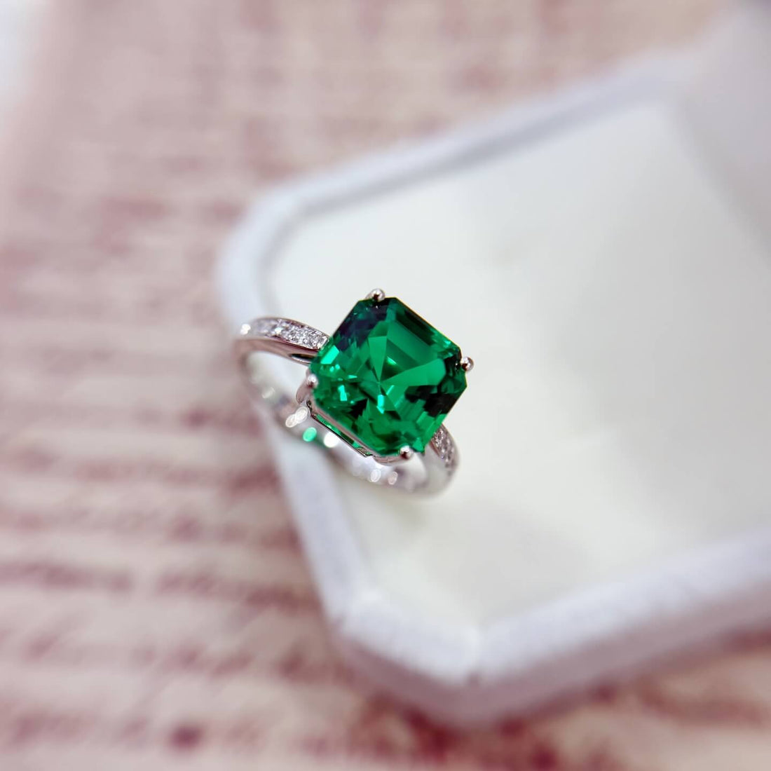 Asscher cut lab grown emerald engagement ring