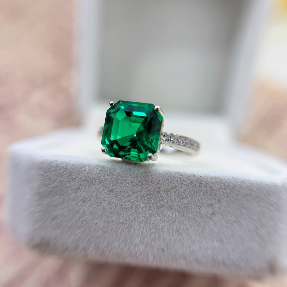 Asscher cut lab grown emerald engagement ring