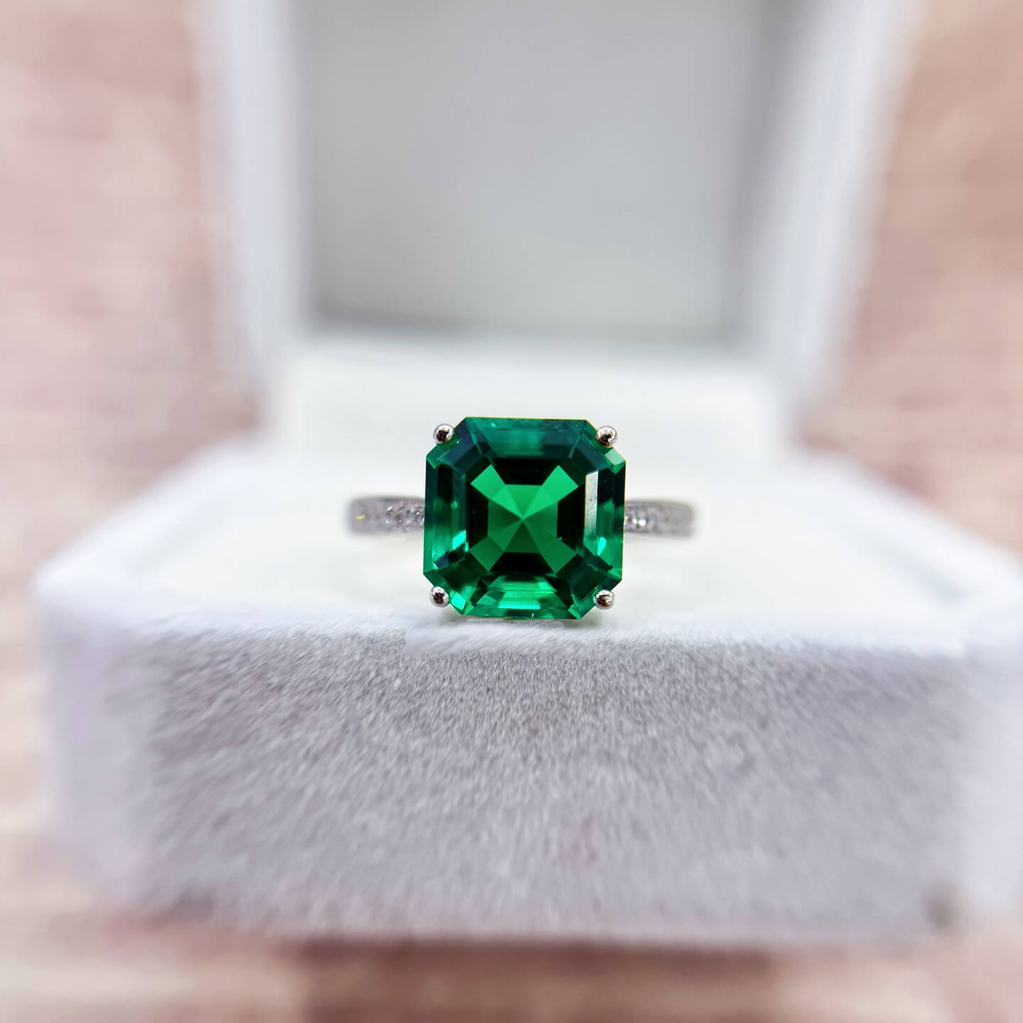 Asscher cut lab grown emerald engagement ring