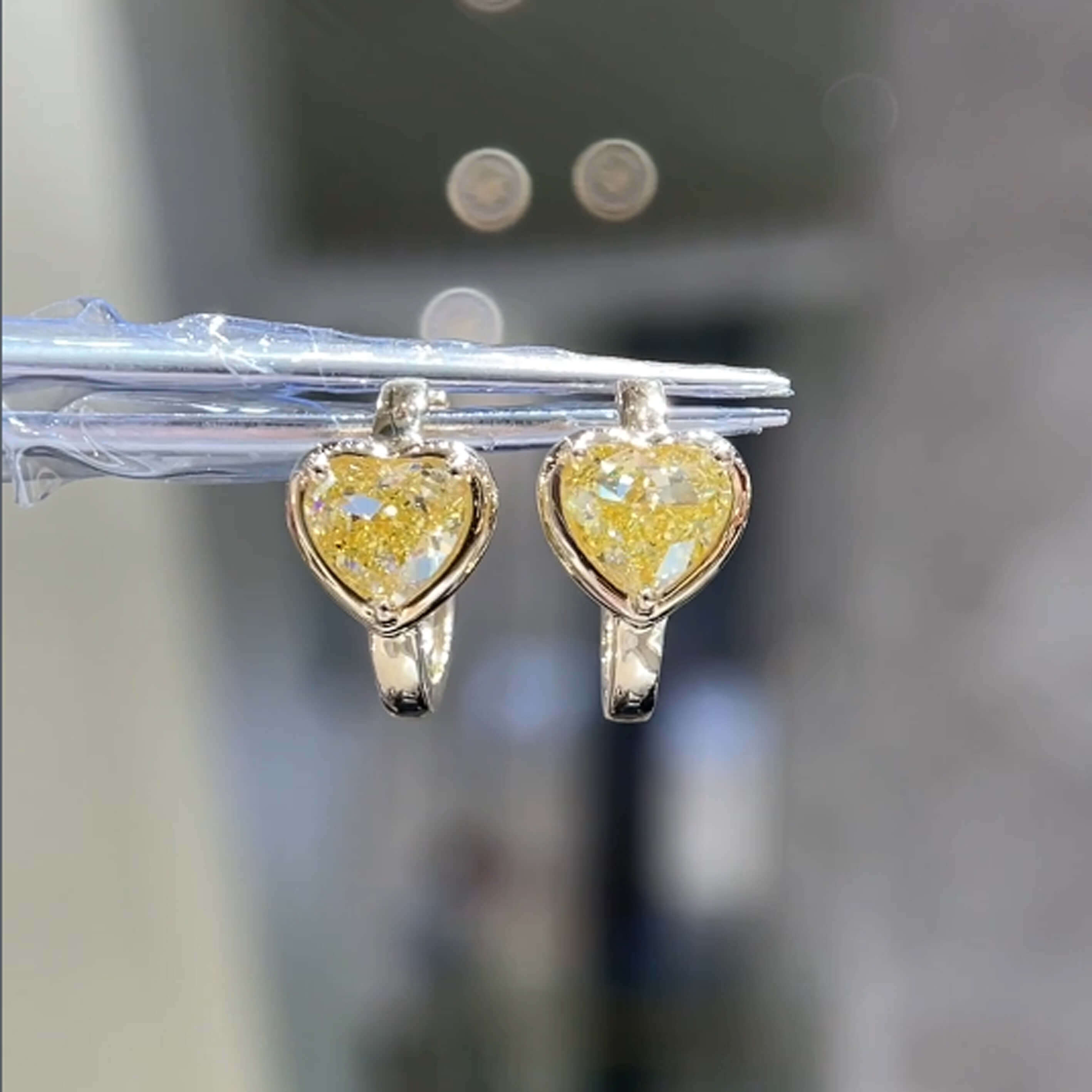 Bezel setting heart cut lab grown yellow diamond hoop earrings