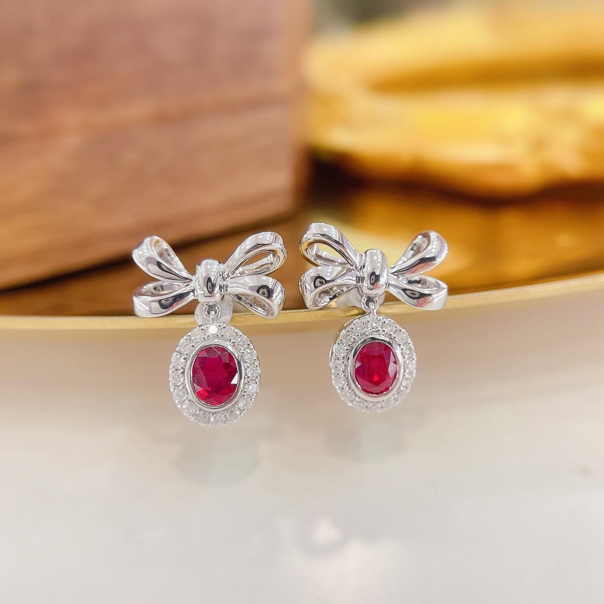 Bow design oval cut lab grown ruby earrings stud