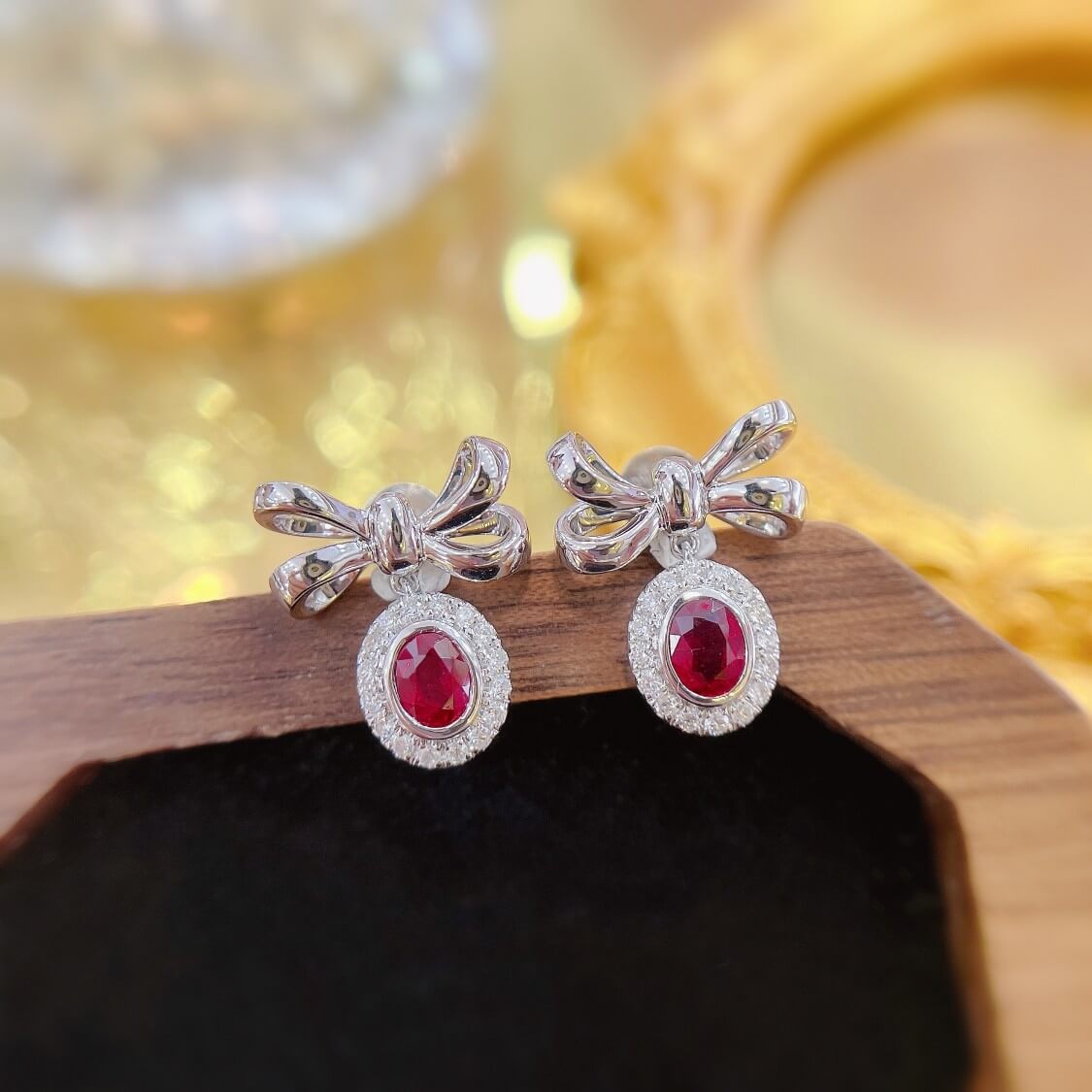 Bow design oval cut lab grown ruby earrings stud