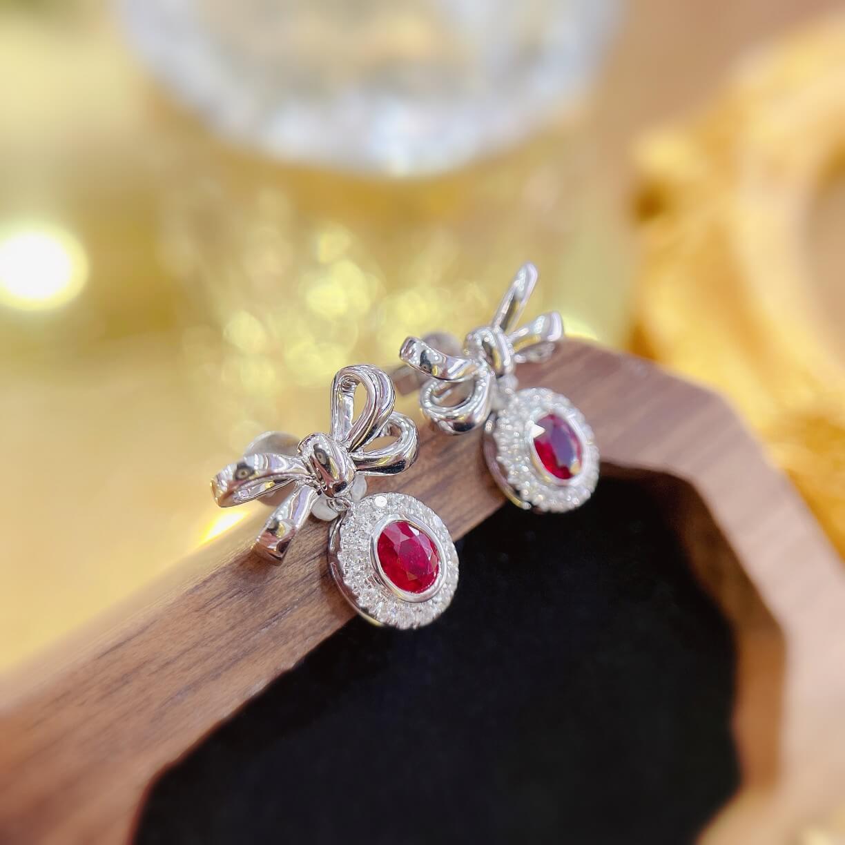 Bow design oval cut lab grown ruby earrings stud