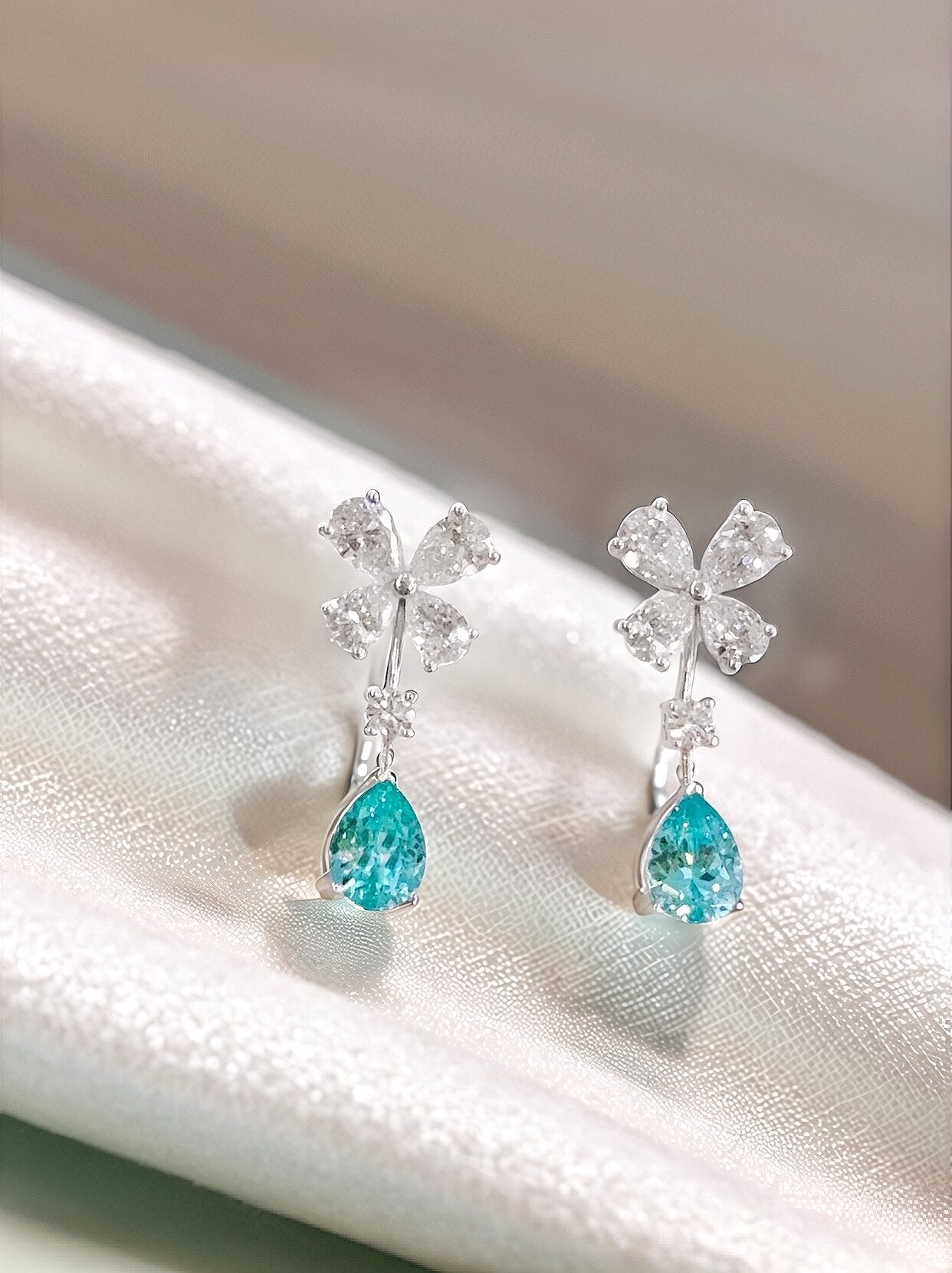Butterfly design pear cut lab grown Paraiba earrings stud