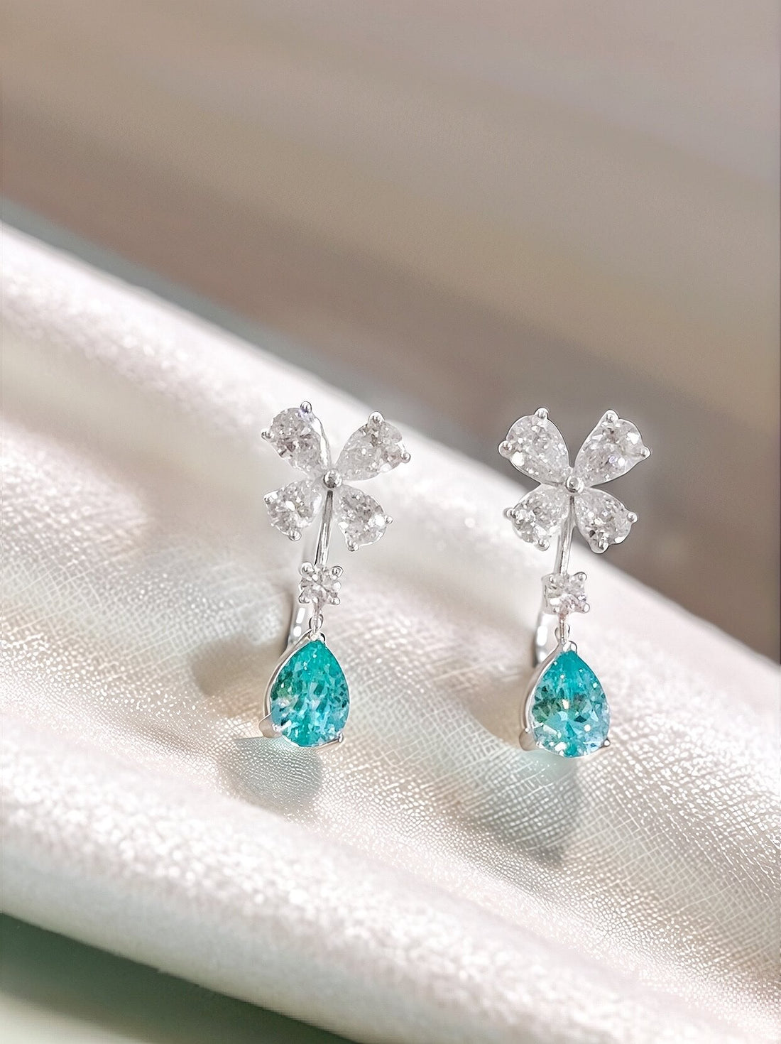 Butterfly design pear cut lab grown Paraiba earrings stud