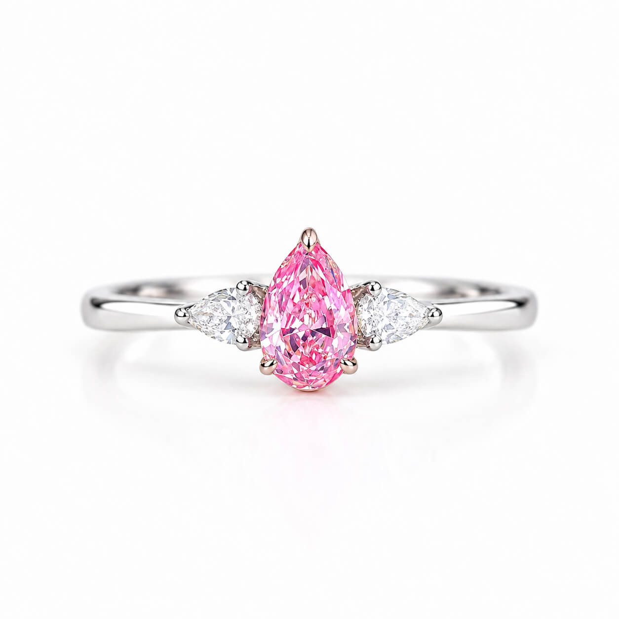 Pear cut lab grown pink diamond three stones engagement ring