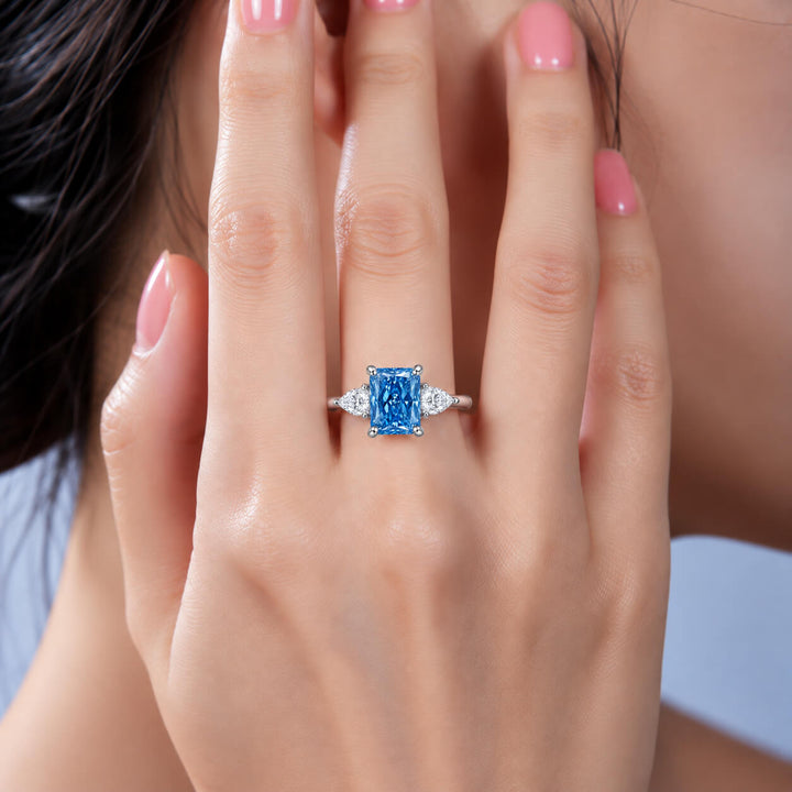 18K gold radiant lab grown blue diamond three stones engagement ring