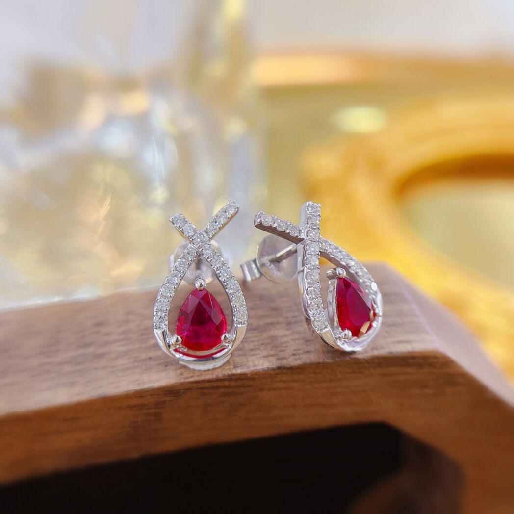 Cross-cut design pear cut lab grown ruby earrings stud