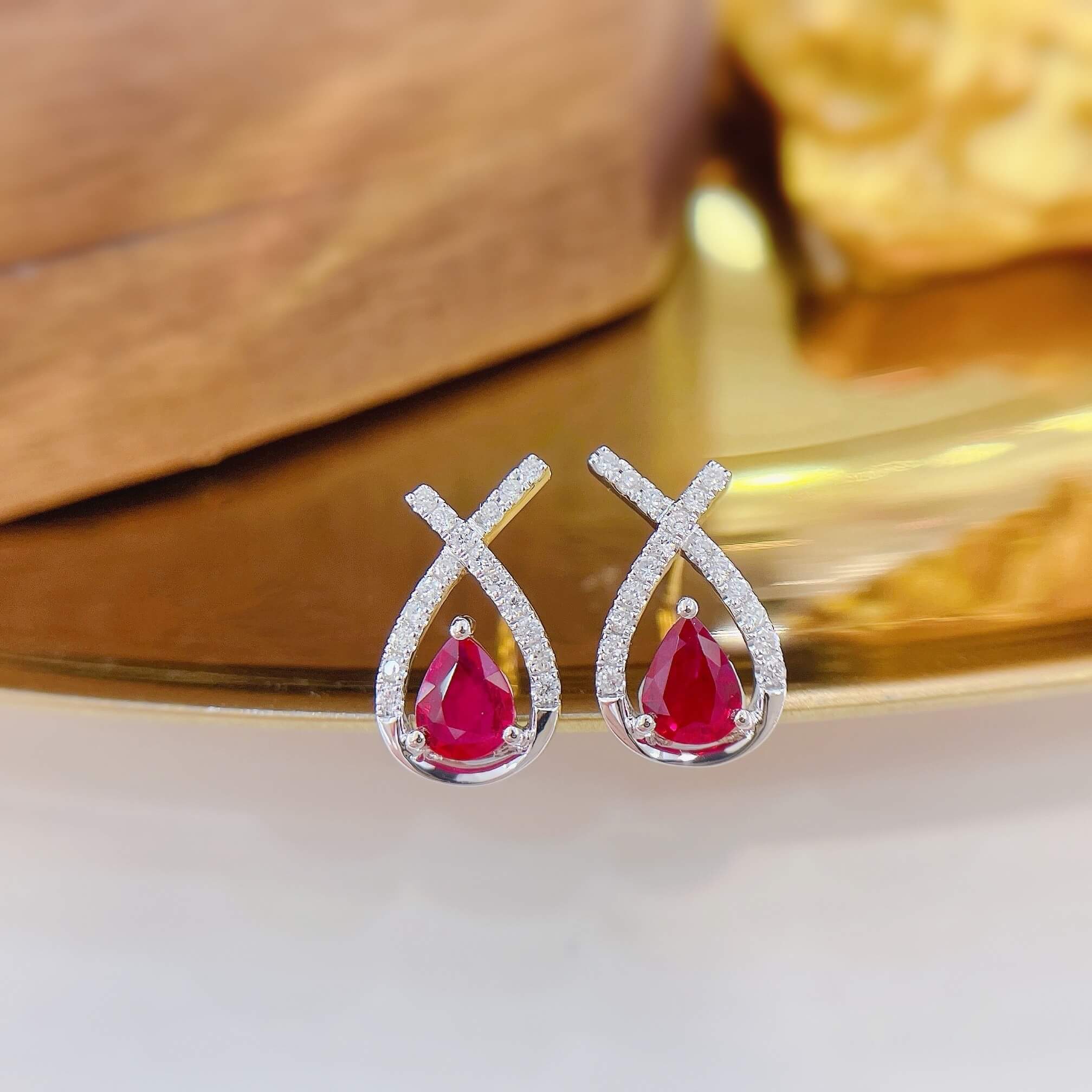 Cross-cut design pear cut lab grown ruby earrings stud