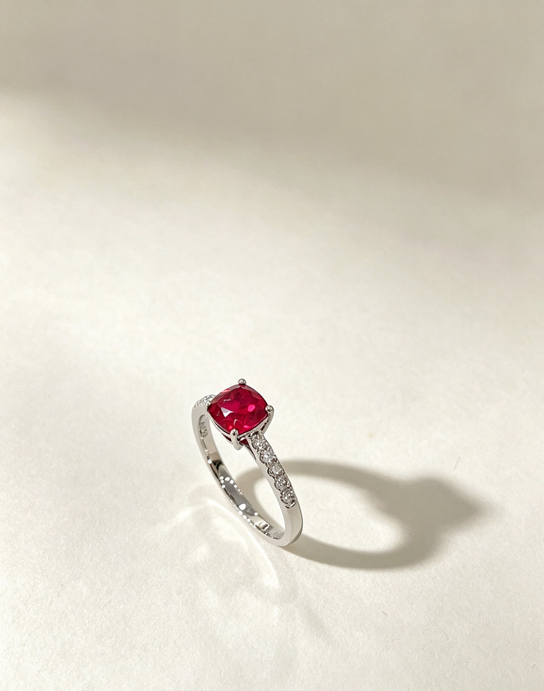 Cushion cut lab grown ruby engagement ring