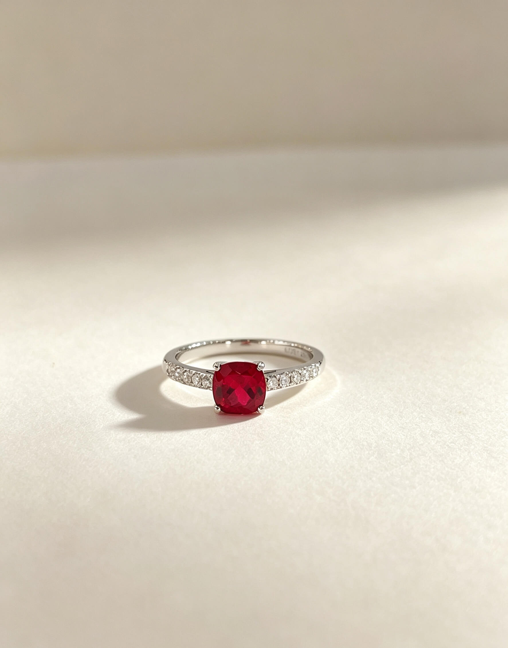Cushion cut lab grown ruby engagement ring