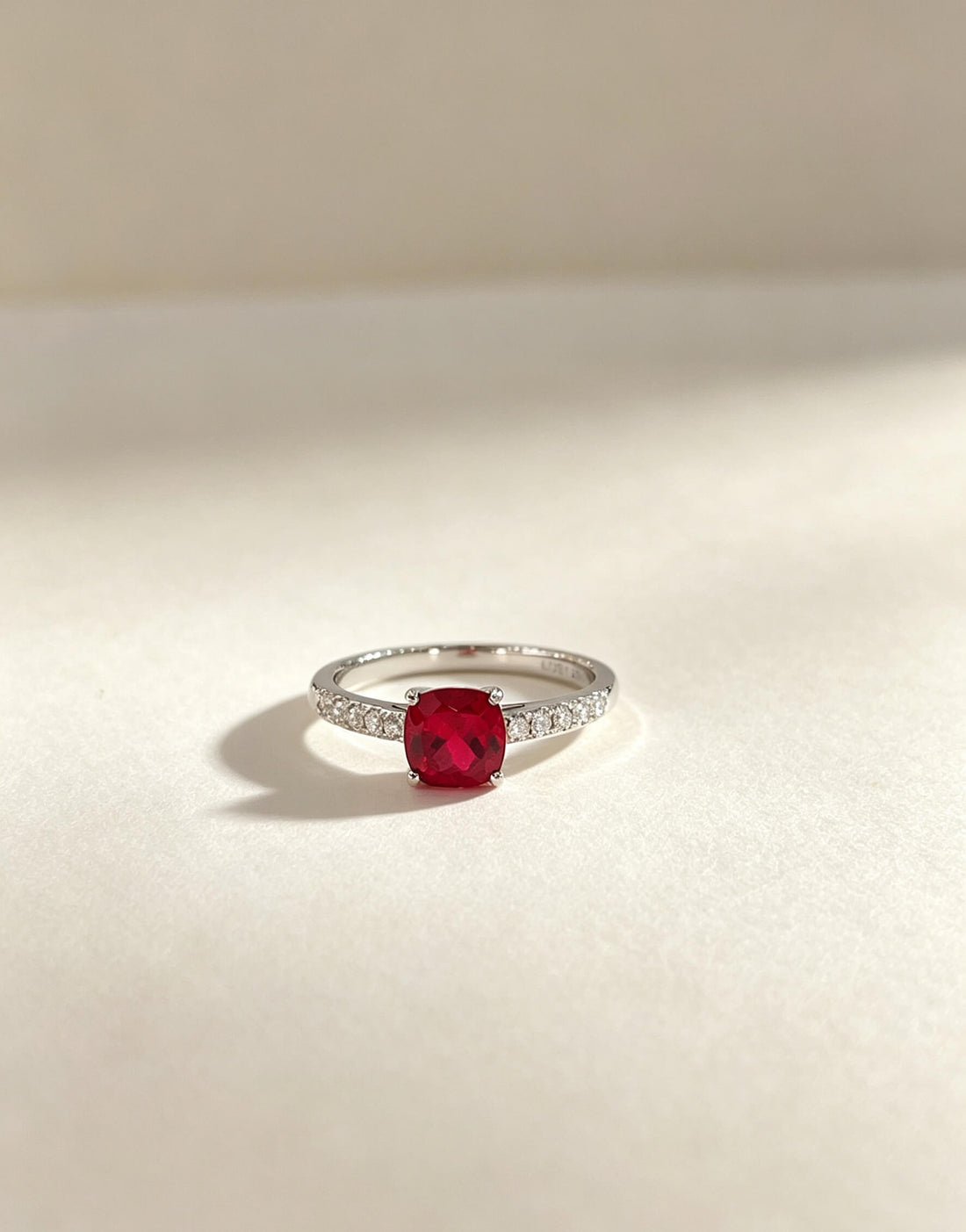 Cushion cut lab grown ruby engagement ring