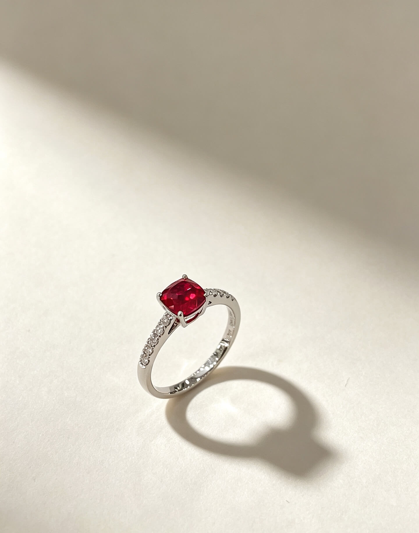 Cushion cut lab grown ruby engagement ring