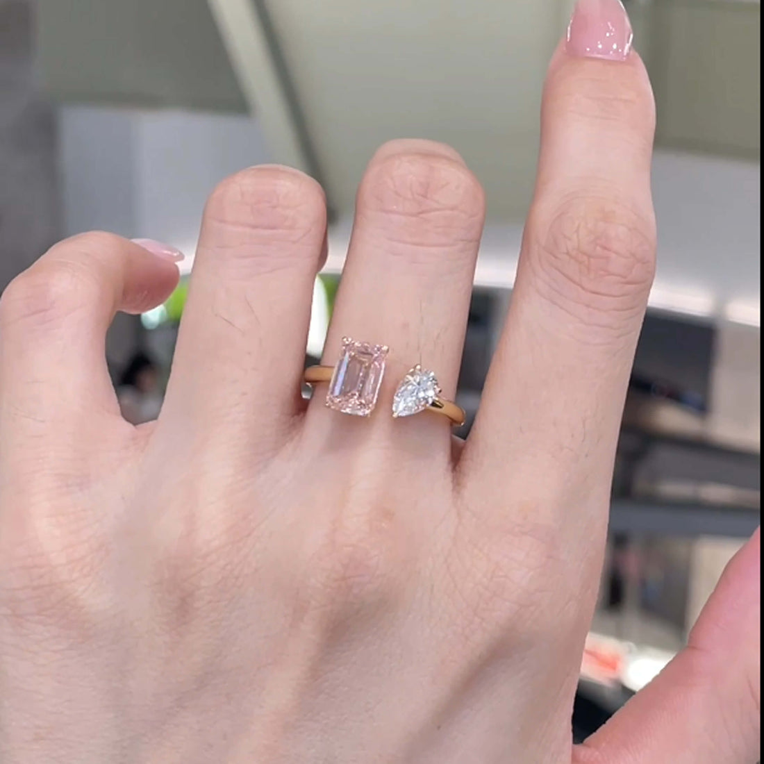 Emerald and pear cut lab grown diamond engagement ring