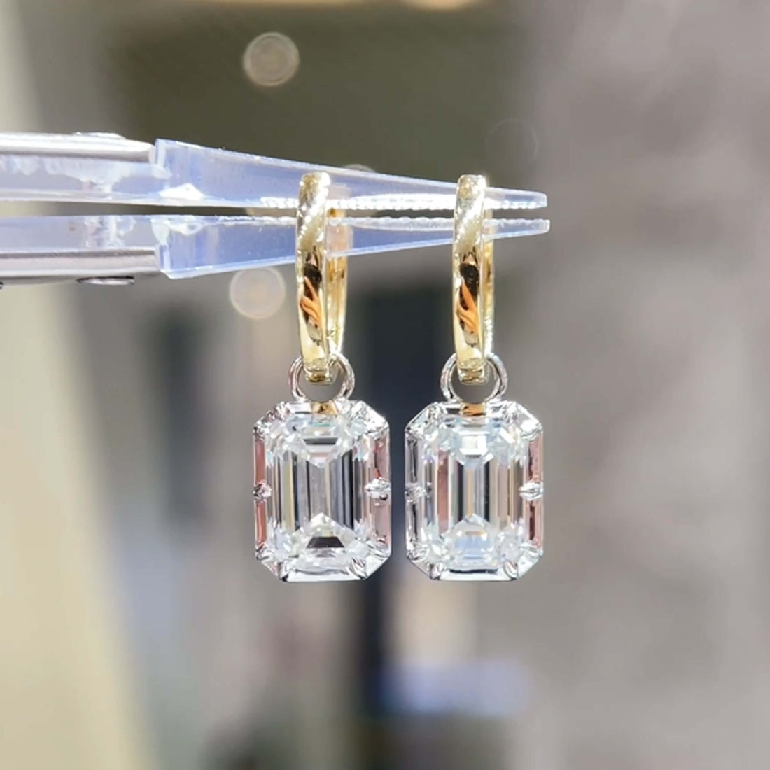 Emerald cut lab grown diamond hoop earrings