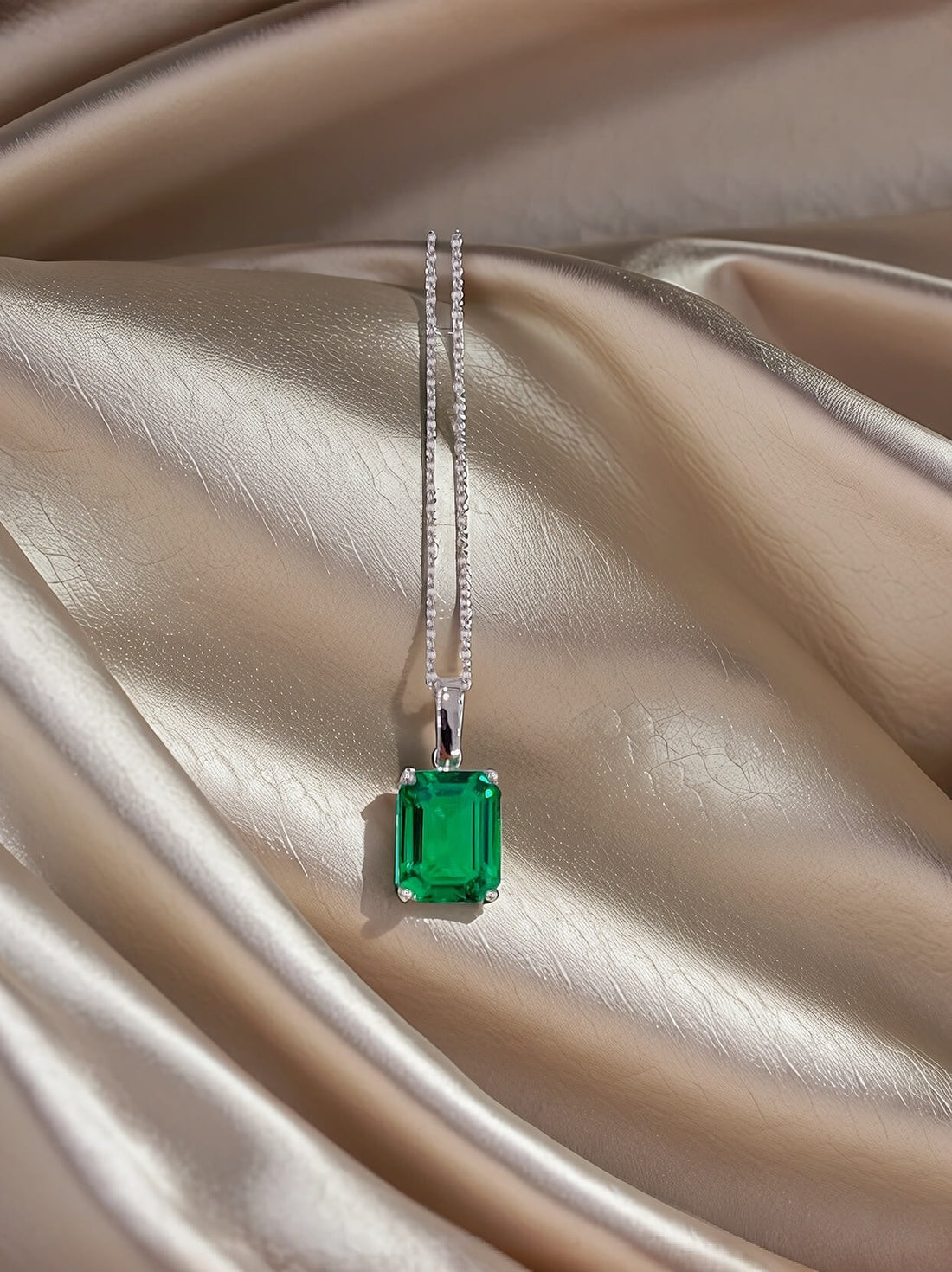 Emerald cut lab grown emerald pendant necklace