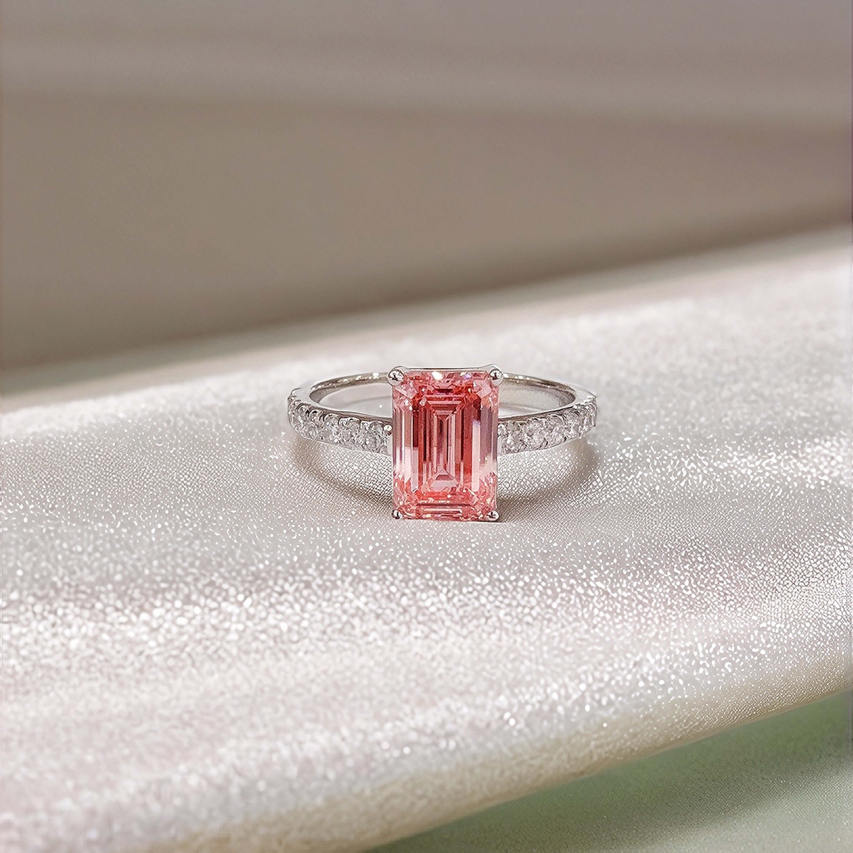 Emerald cut lab grown pink diamond engagement ring