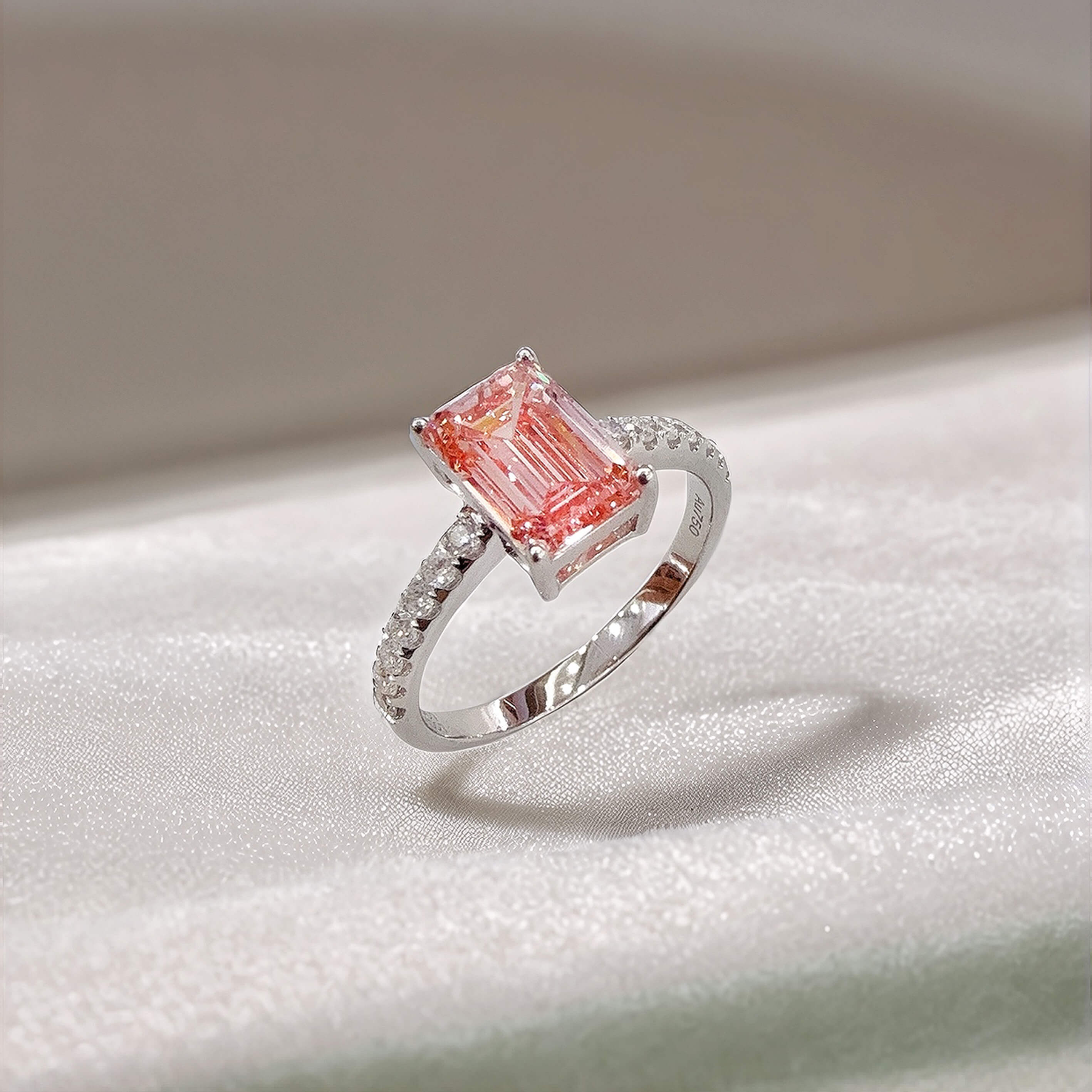 Emerald cut lab grown pink diamond engagement ring