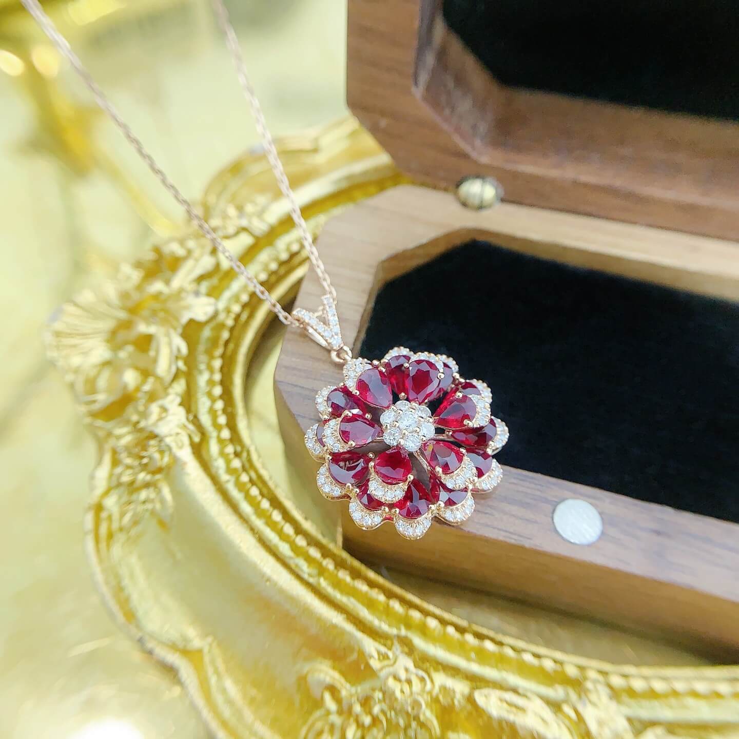 Flower bud design pear cut lab grown ruby pendant necklace