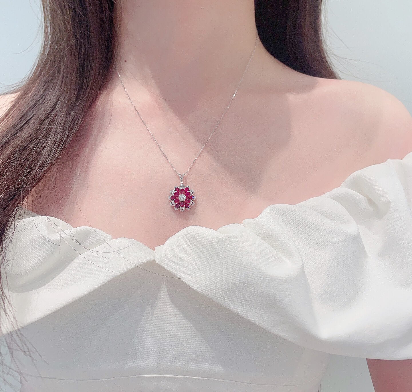Flower bud design pear cut lab grown ruby pendant necklace