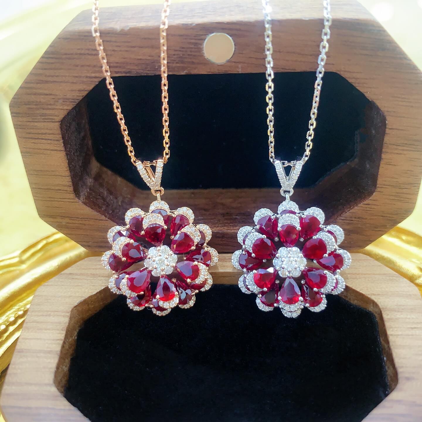 Flower bud design pear cut lab grown ruby pendant necklace