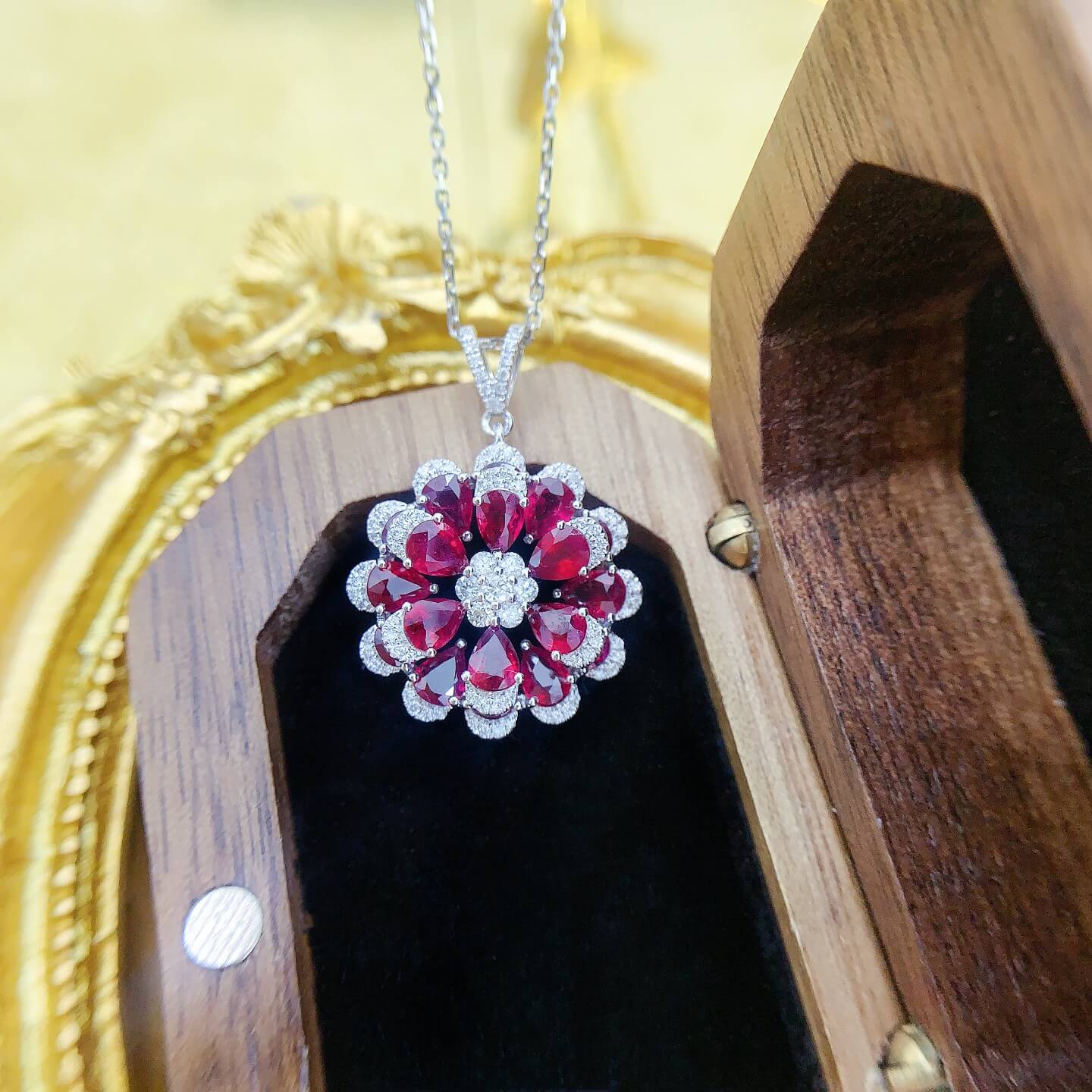 Flower bud design pear cut lab grown ruby pendant necklace