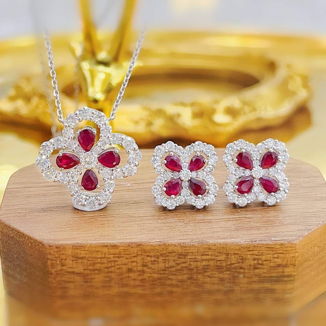 Four-leaf clover design pear cut lab grown ruby earrings stud