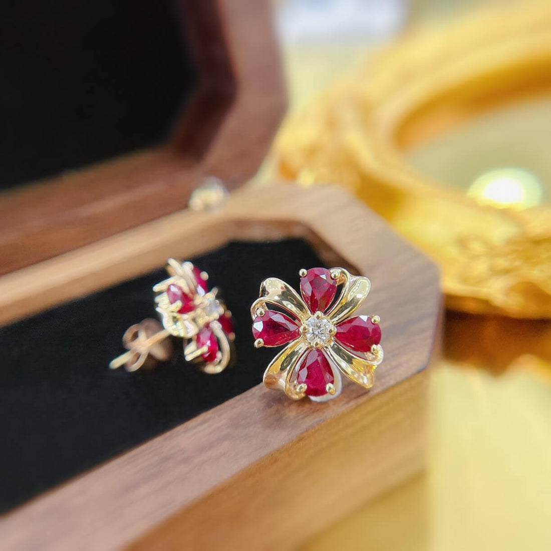 Four-leaf clover design pear cut lab grown ruby earrings stud