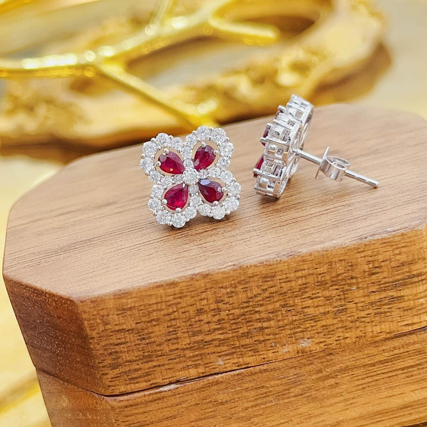 Four-leaf clover design pear cut lab grown ruby earrings stud