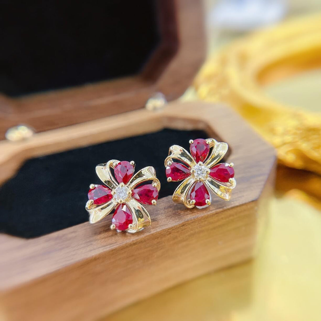 Four-leaf clover design pear cut lab grown ruby earrings stud