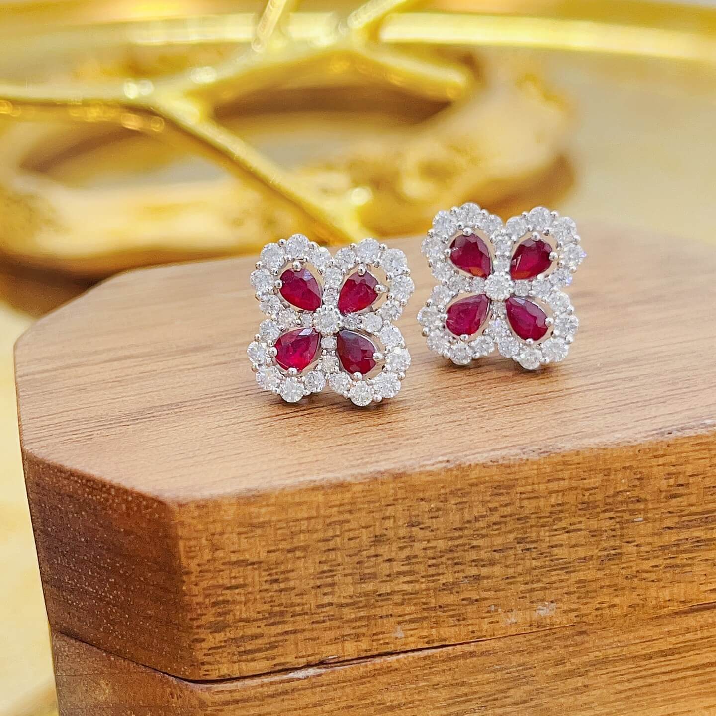 Four-leaf clover design pear cut lab grown ruby earrings stud