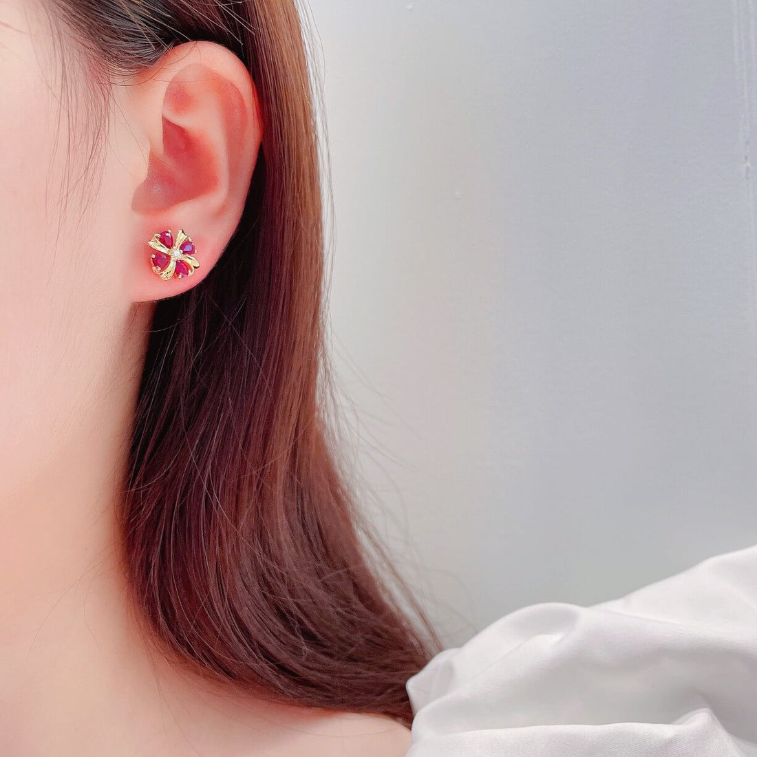 Four-leaf clover design pear cut lab grown ruby earrings stud