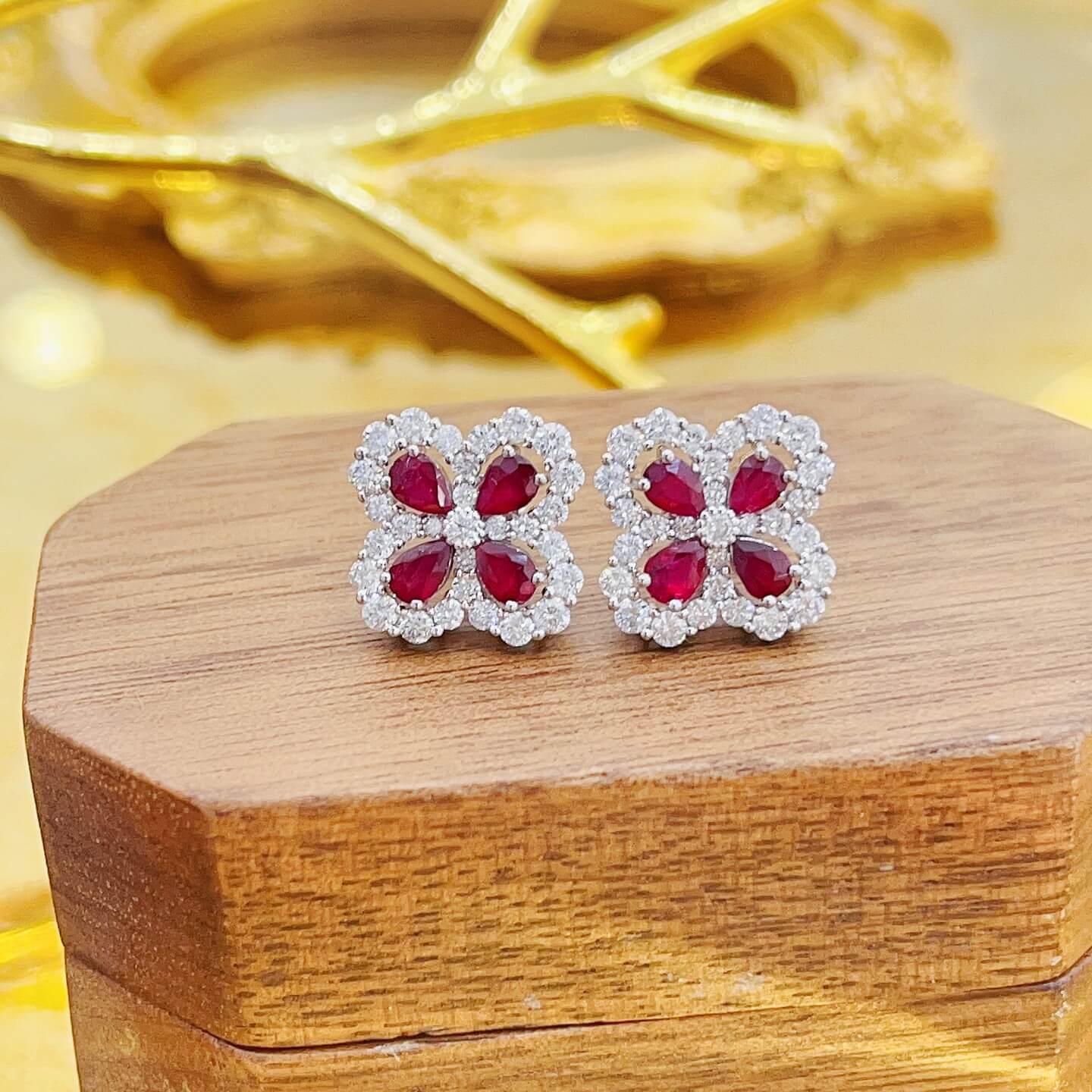 Four-leaf clover design pear cut lab grown ruby earrings stud