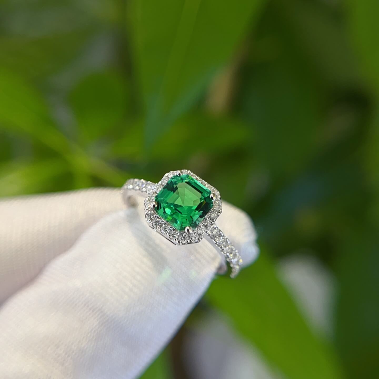 Halo setting asscher cut lab grown emerald engagement ring