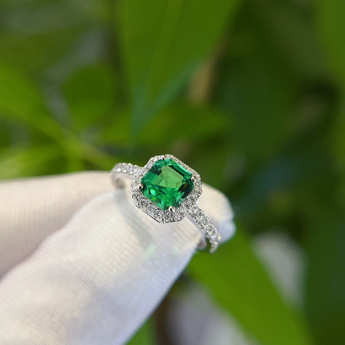 Halo setting asscher cut lab grown emerald engagement ring
