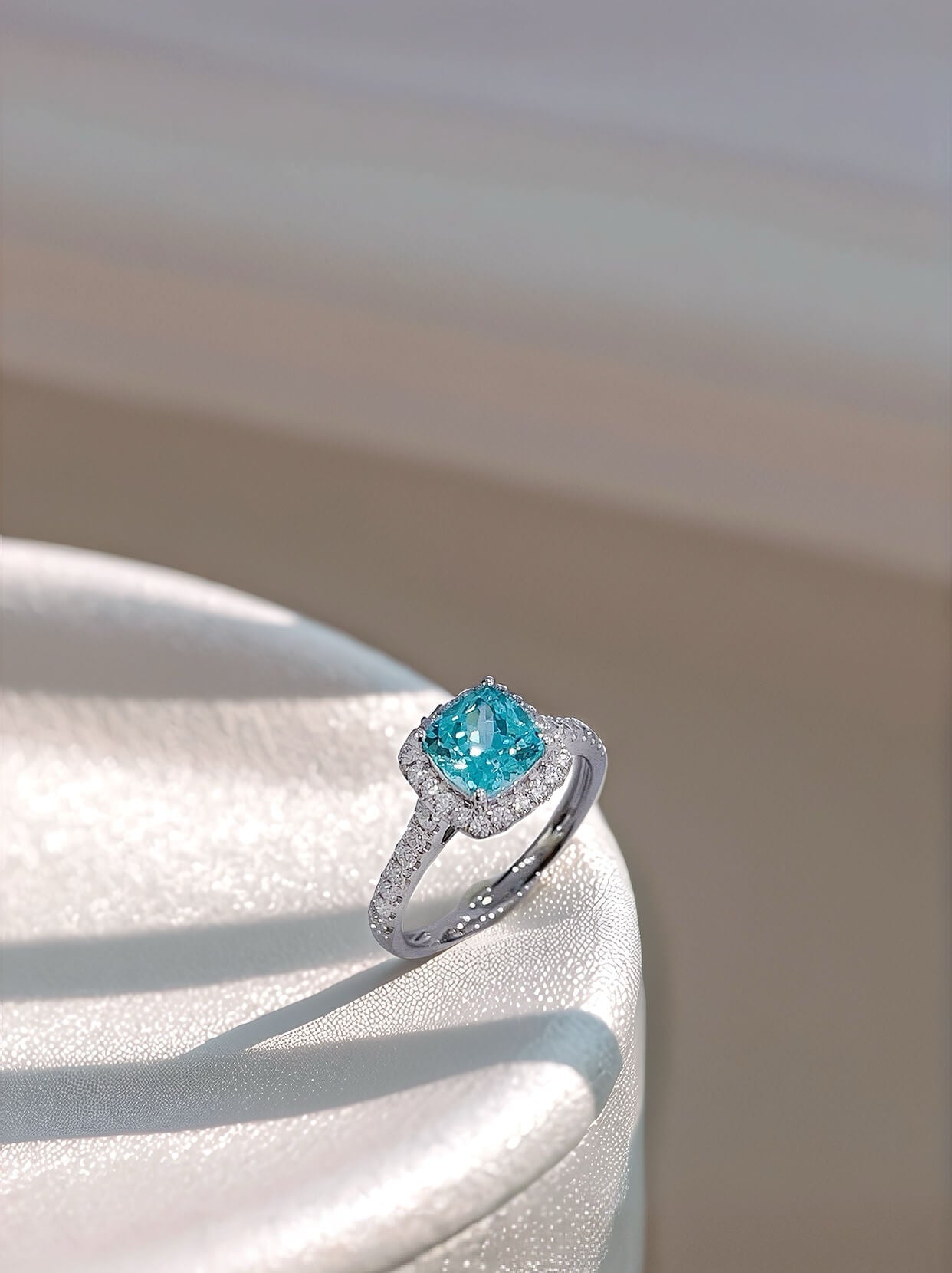 Halo setting cushion cut  lab grown Paraiba engagement ring
