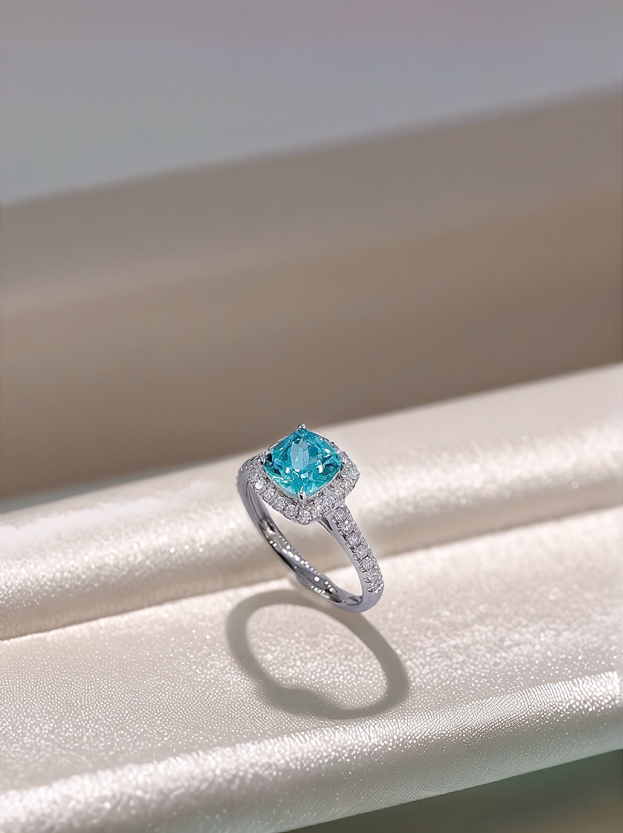 Halo setting cushion cut  lab grown Paraiba engagement ring