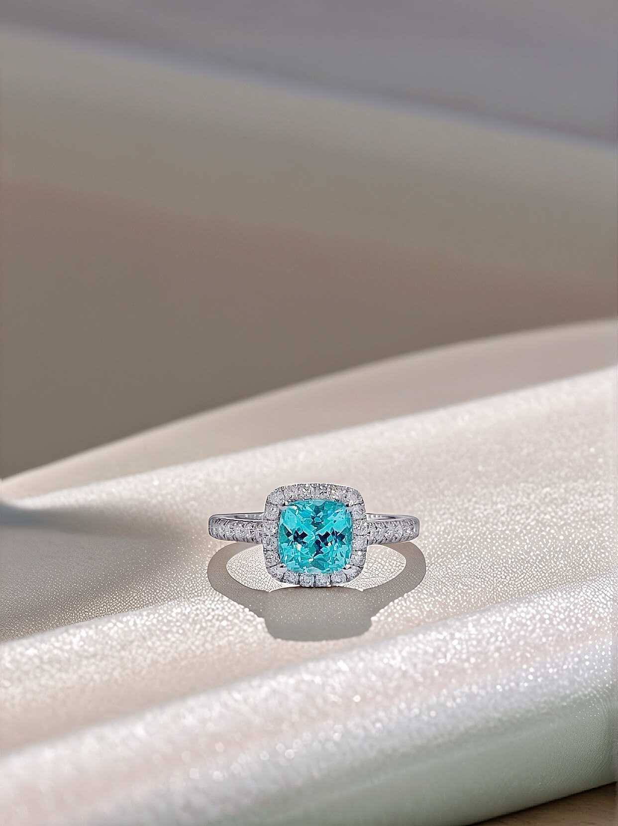 Halo setting cushion cut  lab grown Paraiba engagement ring