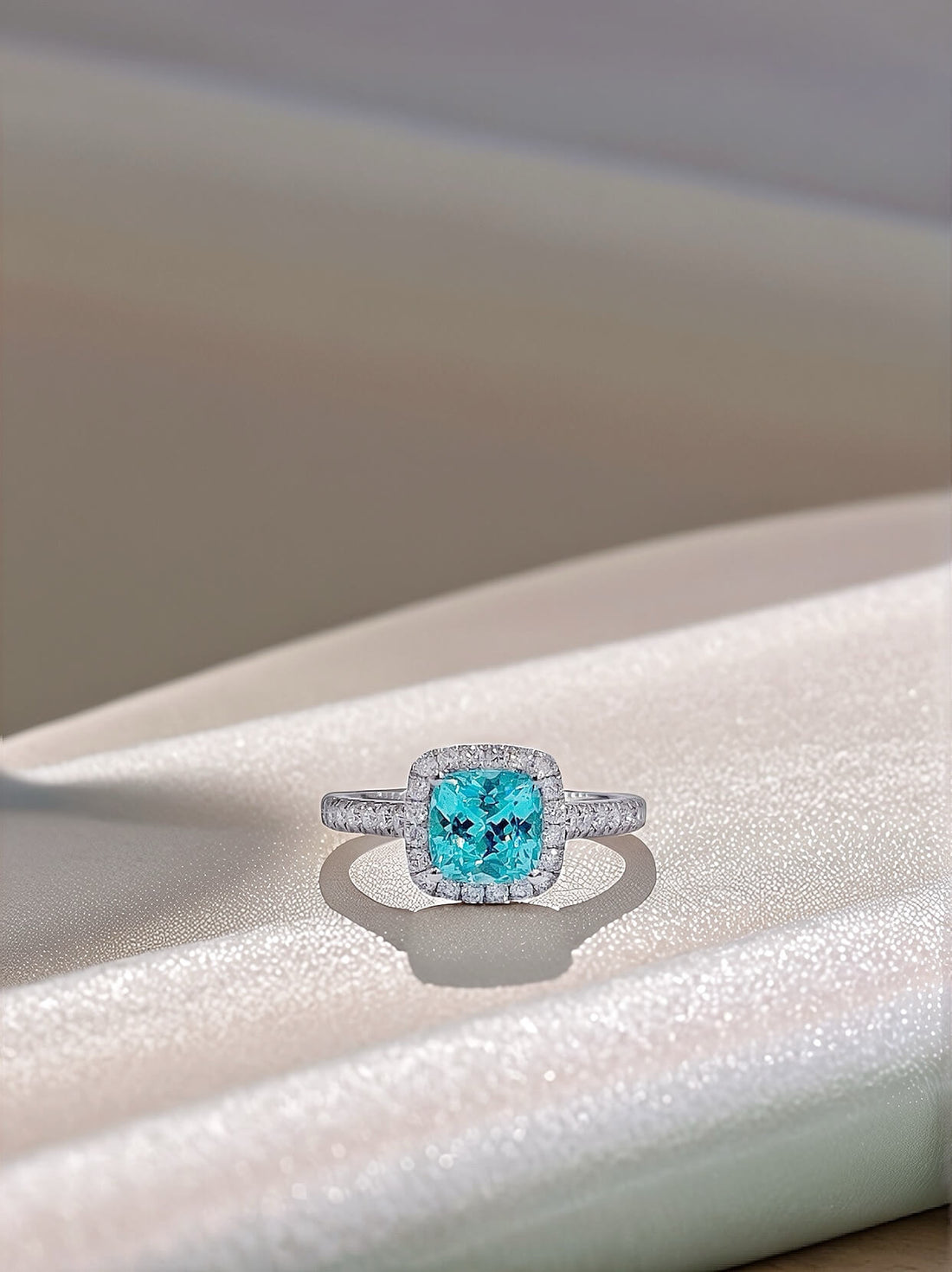 Halo setting cushion cut  lab grown Paraiba engagement ring