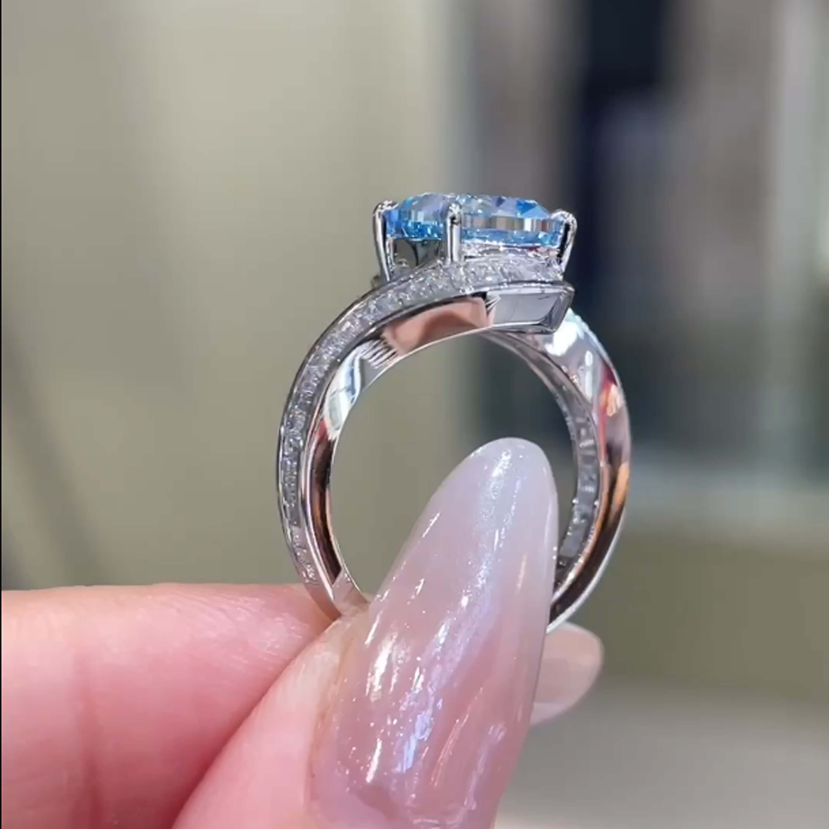 Halo setting cushion cut lab grown blue diamond engagement ring