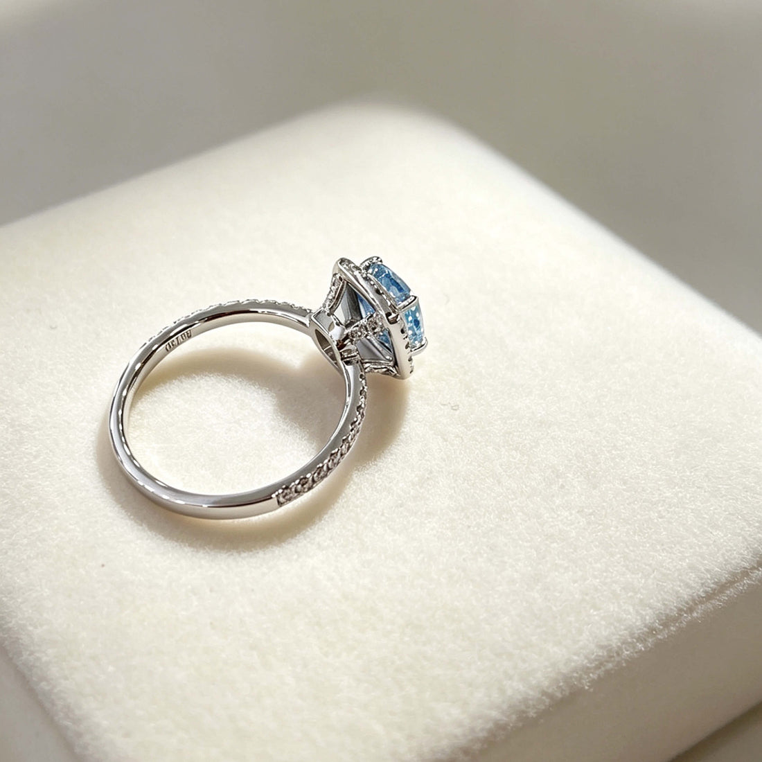 Halo setting cushion cut lab grown blue diamond engagement ring