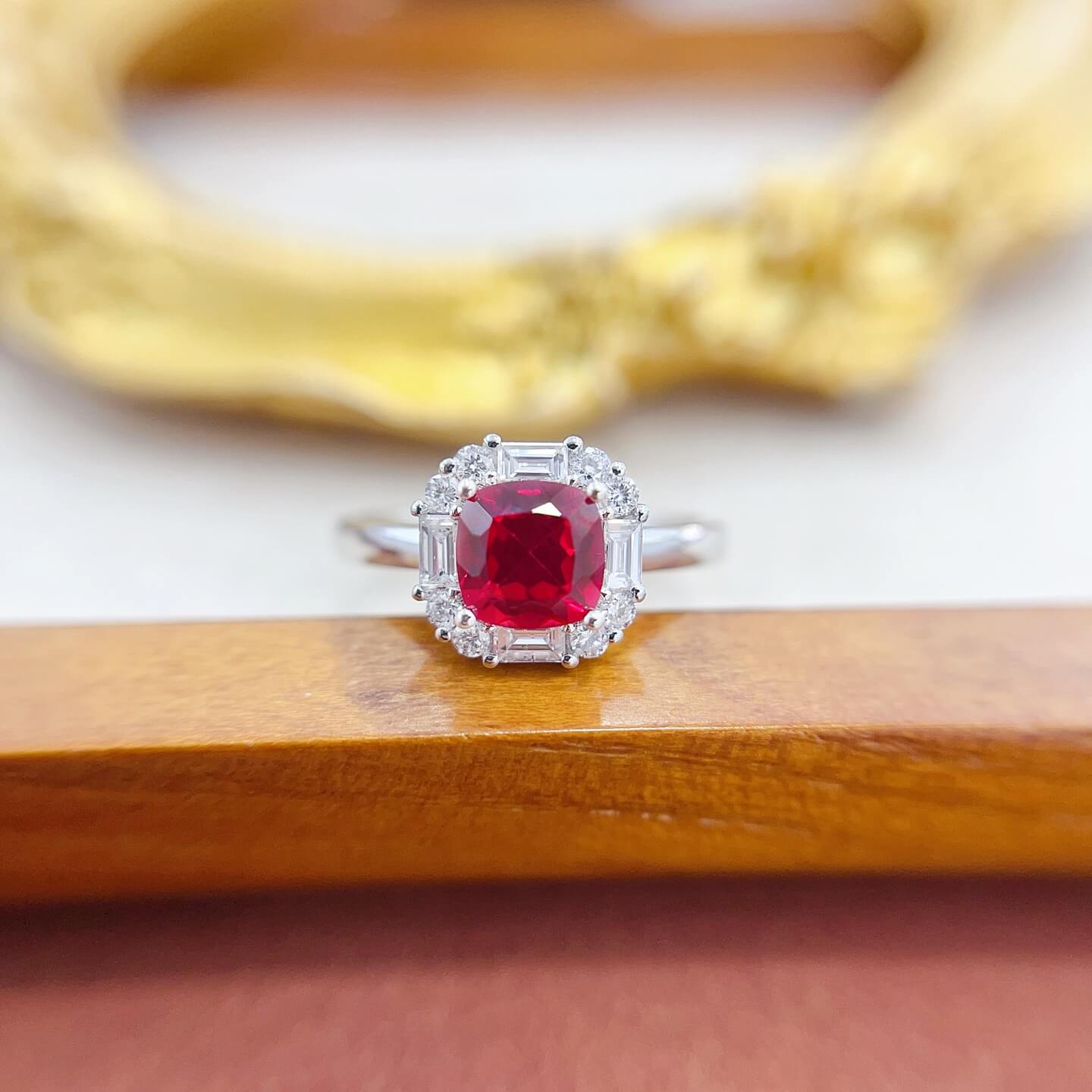Halo setting cushion cut lab grown ruby engagement ring
