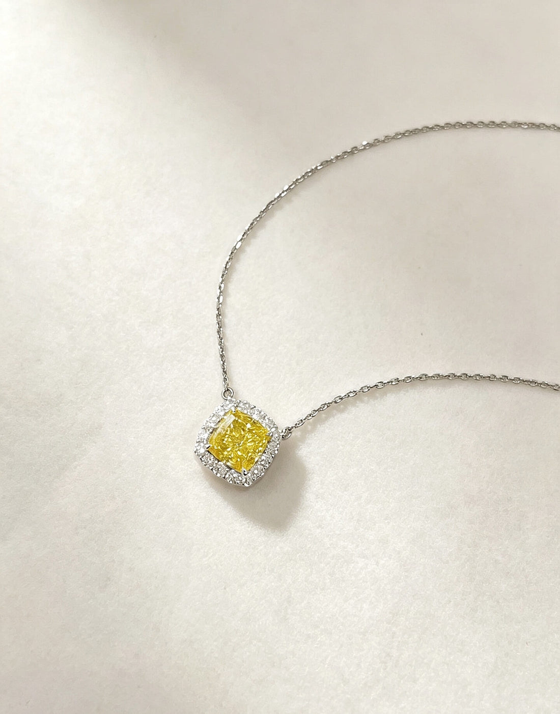 Halo setting cushion cut lab grown yellow diamond pendant necklace