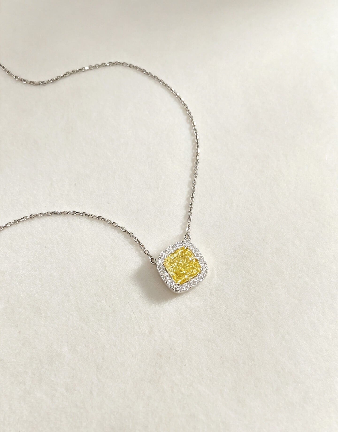 Halo setting cushion cut lab grown yellow diamond pendant necklace