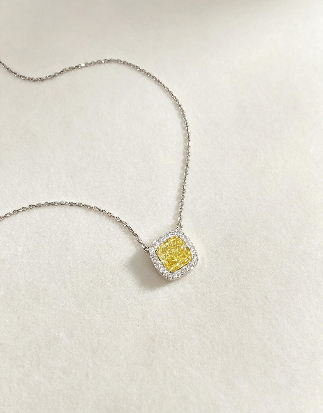 Halo setting cushion cut lab grown yellow diamond pendant necklace