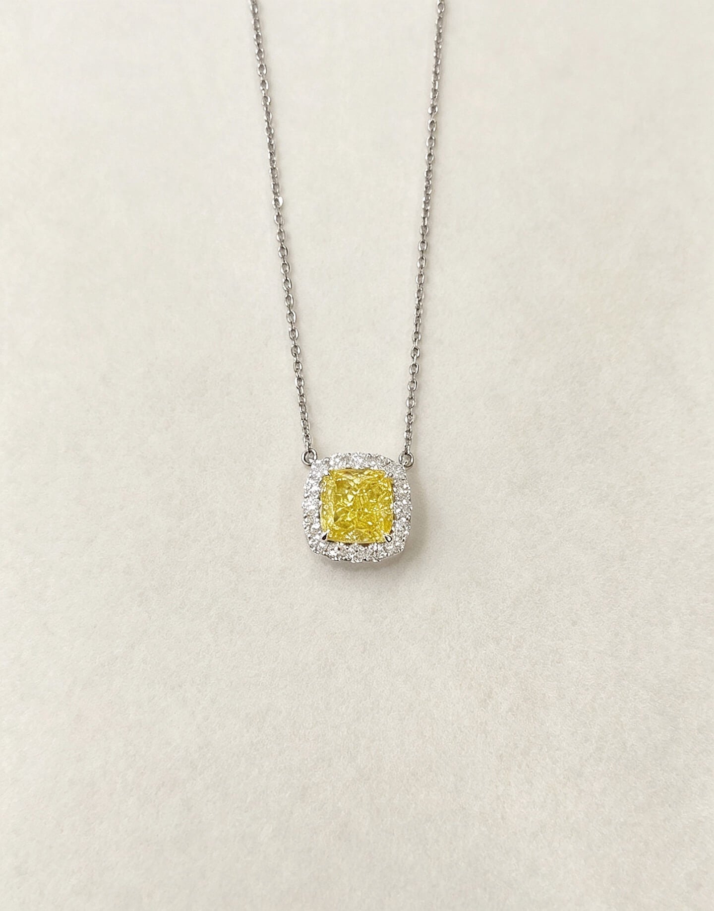 Halo setting cushion cut lab grown yellow diamond pendant necklace