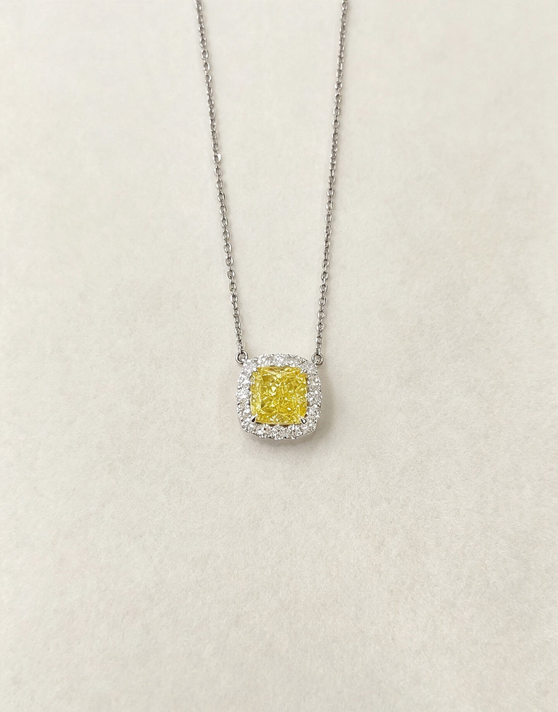 Halo setting cushion cut lab grown yellow diamond pendant necklace
