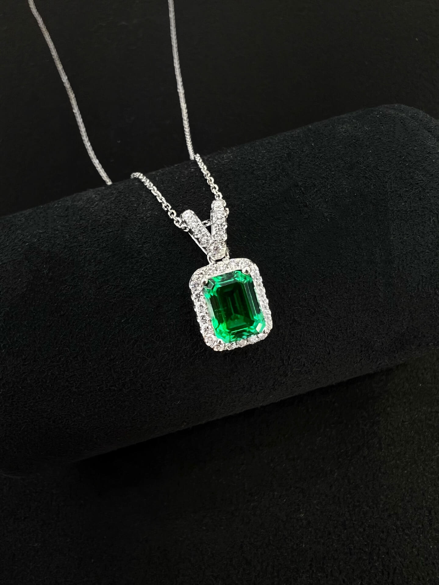 Halo setting emerald cut lab grown emerald pendant necklace